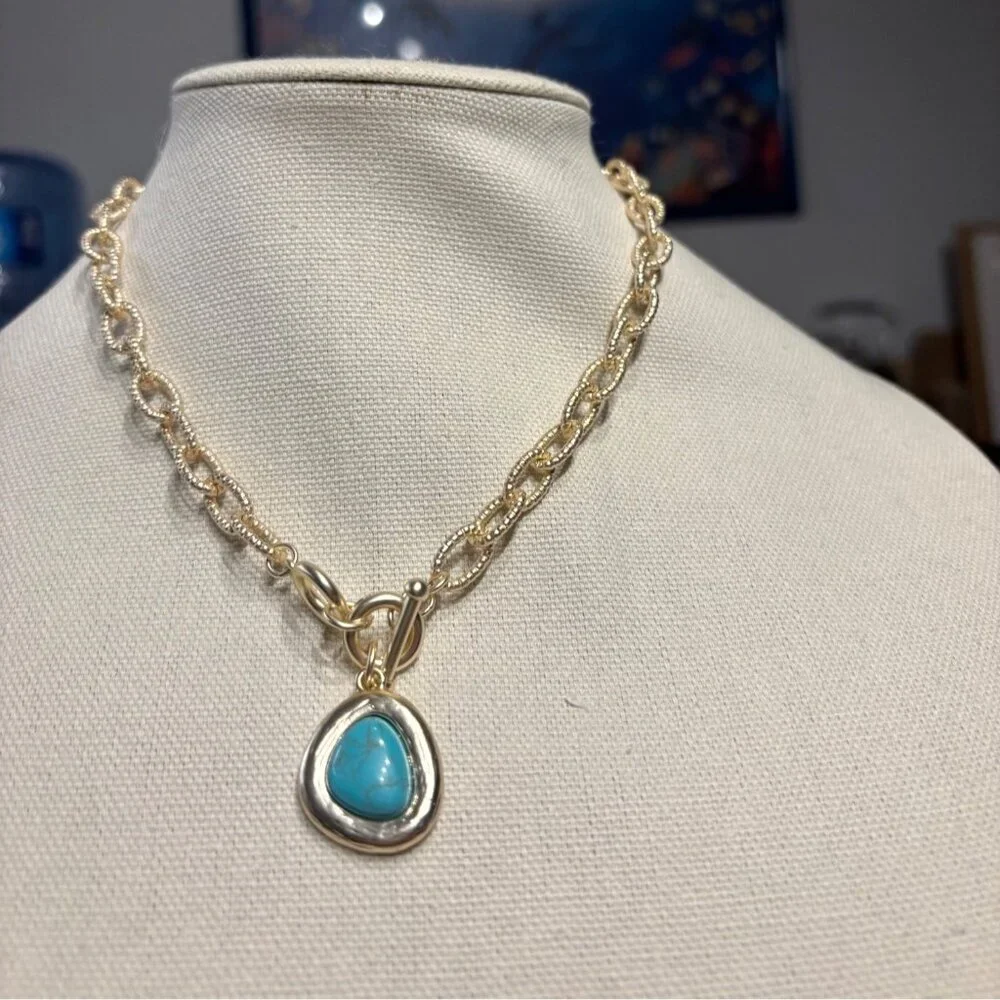 Gold Chain Necklace With Blue Teardrop Stone Pendant